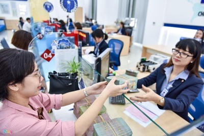 Lãi suất ngân hàng tiếp tục hạ nhiệt