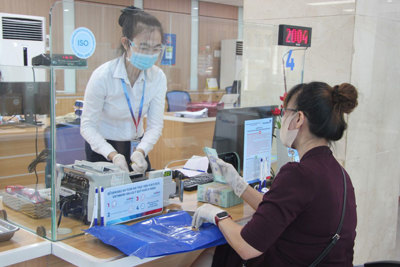 Nhiều ngân hàng hạ lãi suất huy động