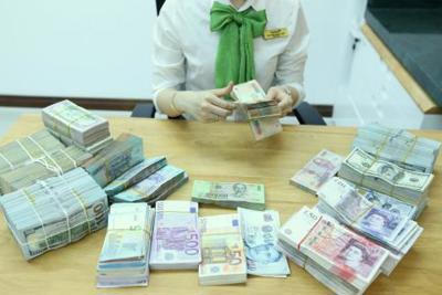 Căng thẳng Mỹ - Trung: Thị trường ngoại hối, chứng khoán trong nước biến động mạnh
