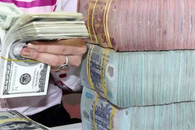 Vay VND hay USD?