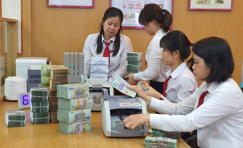 Cán bộ Agribank luôn tận tâm và trách nhiệm với công việc. Nguồn: Agribank.