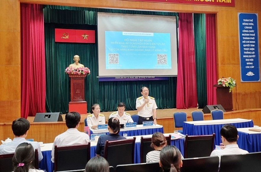 Phó Cục trưởng Cục Thuế TP. Hồ Chí Minh Nguyễn Tiến Dũng phát biểu tại hội nghị. Ảnh: ĐD