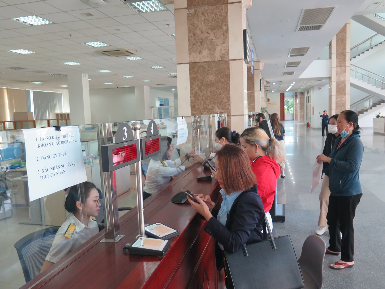 Thuế TP. Hồ Chí Minh quyết tâm thu hồi nợ thuế, đặc biệt là các khoản nợ liên quan đến đất đai, bất động sản. Ảnh: ĐM