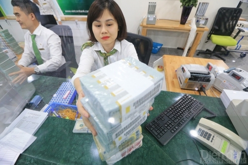 Theo VCCI, qua rà soát, hiện nay, cơ sở pháp lý của chính sách giới hạn tăng trưởng tín dụng rất mỏng. Ảnh minh họa: Quốc Tuấn