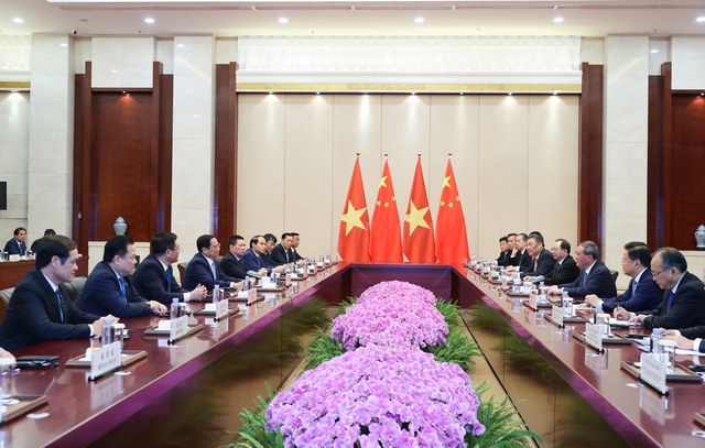 Hai Thủ tướng b&agrave;y tỏ vui mừng v&agrave; đ&aacute;nh gi&aacute; cao những tiến triển trong quan hệ Việt - Trung thời gian qua - Ảnh: VGP/Nhật Bắc