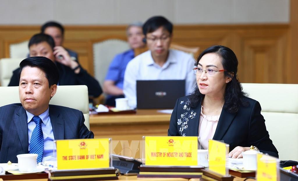 Thứ trưởng Bộ Công Thương Phan Thị Thắng phát biểu tại tọa đàm. Ảnh: Dương Giang - TTXVN. 