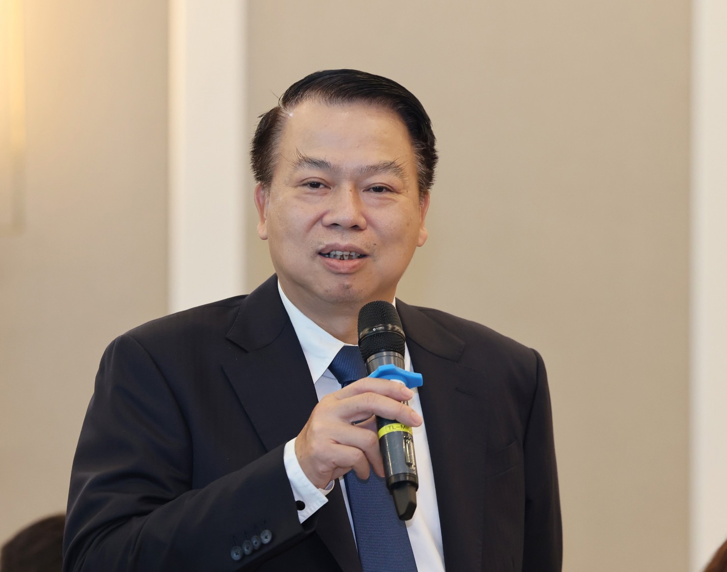 Thứ trưởng Bộ Tài chính Nguyễn Đức Chi phát biểu tại Hội thảo.