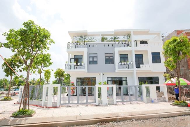Nhà phố Thành Đô có thiết kế một trệt, 2 lầu, 3 phòng ngủ. Ảnh LDG