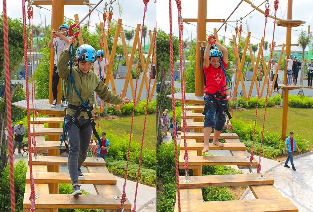 C&aacute;c bạn trẻ trải nghiệm tr&ograve; chơi tại tổ hợp Adventure Forest trong ng&agrave;y kh&aacute;nh th&agrave;nh c&ocirc;ng vi&ecirc;n Gem Sky Park. Ảnh : DXG