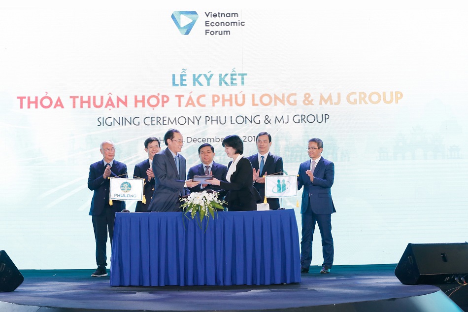 Nghi thức ký kết giữa Phú Long và tập đoàn MJ dưới sự chứng kiến của lãnh đạo cấp cao. Ảnh Thu Hoài