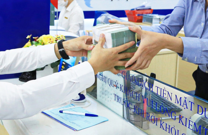 Nợ xấu của hệ thống ngân hàng được nhận định sẽ tăng lên khi hết thời hạn giữ nguyên nhóm nợ đối với các khoản nợ của khách hàng bị tác động bởi dịch Covid-19. Ảnh minh họa: Tạ Hải