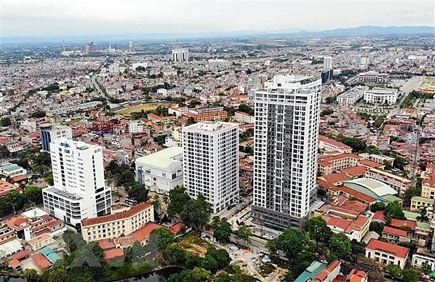 Sức mua trên thị trường bất động sản giảm sút mạnh vì dịch bệnh kéo dài. Ảnh: TTXVN
