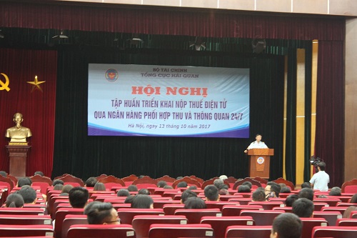 Toàn cảnh Hội nghị tập huấn triển khai nộp thuế điện tử qua ngân hàng phối hợp thu và thông quan 24/7