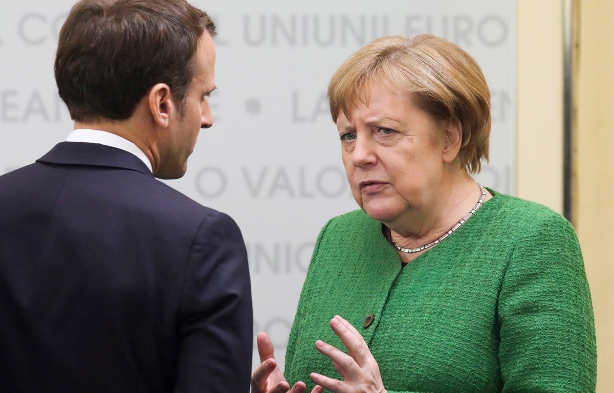 Tổng thống Pháp Macron (trái) và Thủ tướng Đức Merkel. (Nguồn: EPA)
