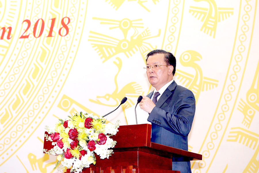 Bộ trưởng Bộ Tài chính Đinh Tiến Dũng phát biểu tại Hội nghị.