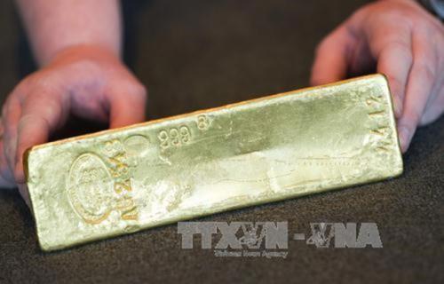 Giá vàng thế giới áp sát mức "đỉnh" trong 5 tháng. Ảnh minh họa: TTXVN