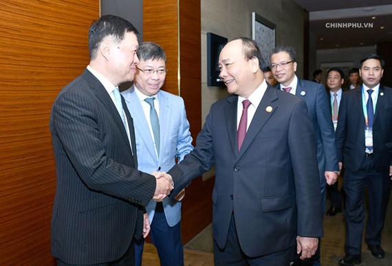 Thủ tướng Nguyễn Xuân Phúc và Phó Chủ tịch, Tổng giám đốc Tập đoàn Tài chính Bình An Tống Thành Lập.