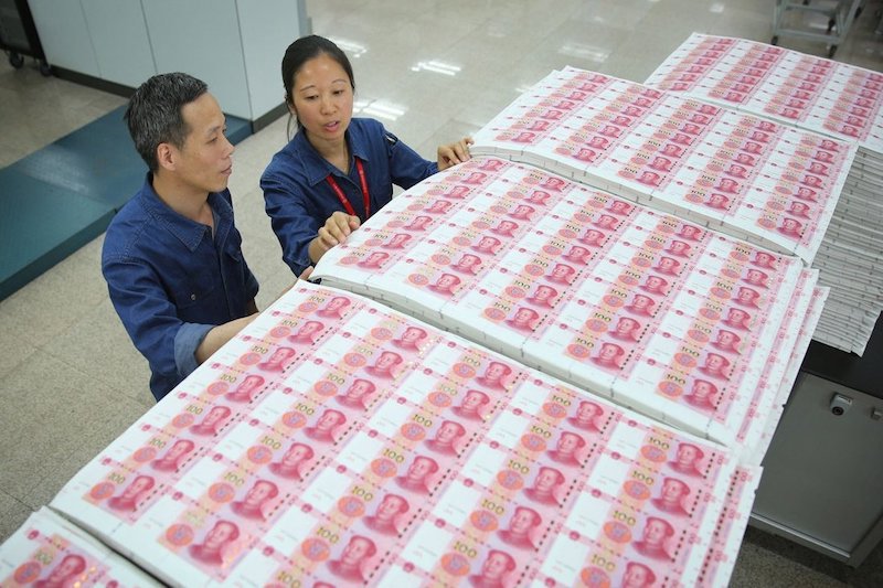 Khoản cho vay \mới của Trung Quốc đạt kỷ lục 19,95 nghìn tỷ NDT (3,1 nghìn tỷ USD) trong năm 2021, tăng 1,6% so với 19,63 nghìn tỷ NDT vào năm 2020. Nguồn: AFP