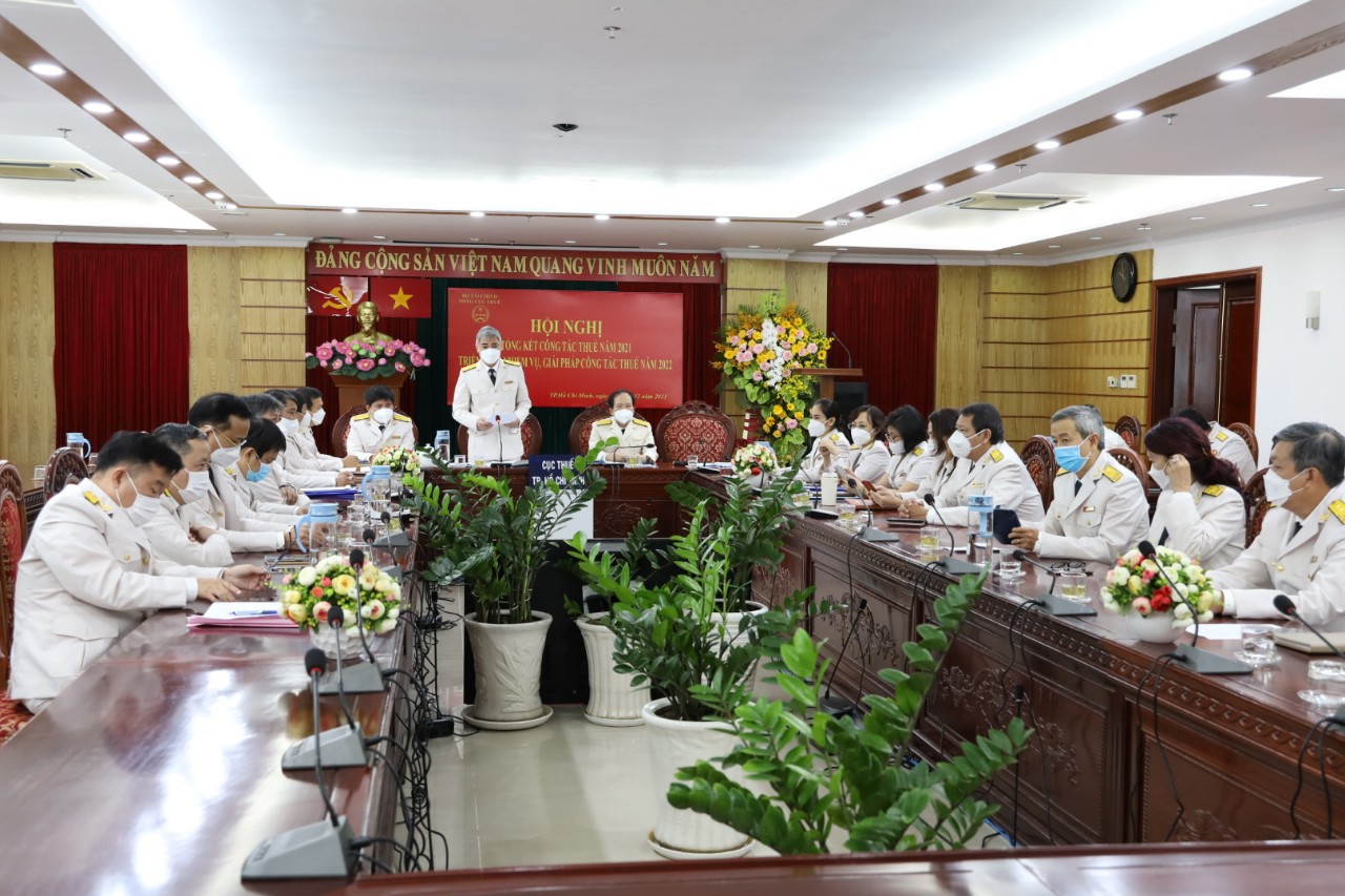 Cục trưởng Cục Thuế TP. Hồ Chí Minh Lê Duy Minh báo cáo tại Hội nghị.