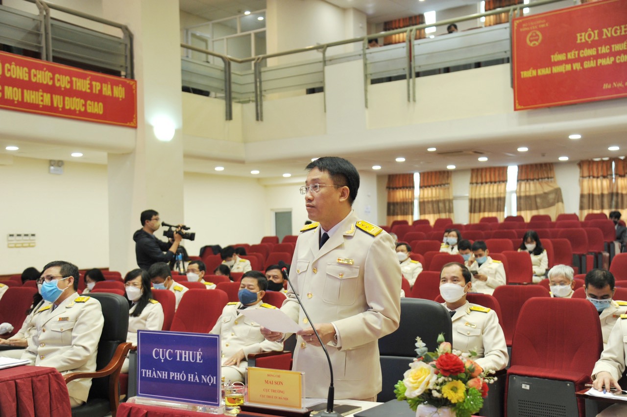 Cục trưởng Cục Thuế TP. Hà Nội Mai Sơn báo cáo tham luận tại Hội nghị.