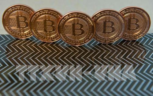 Cơ quan Giám sát Tài chính Hàn Quốc cảnh báo "bong bóng" bitcoin sẽ vỡ. Ảnh minh họa: AFP/TTXVN