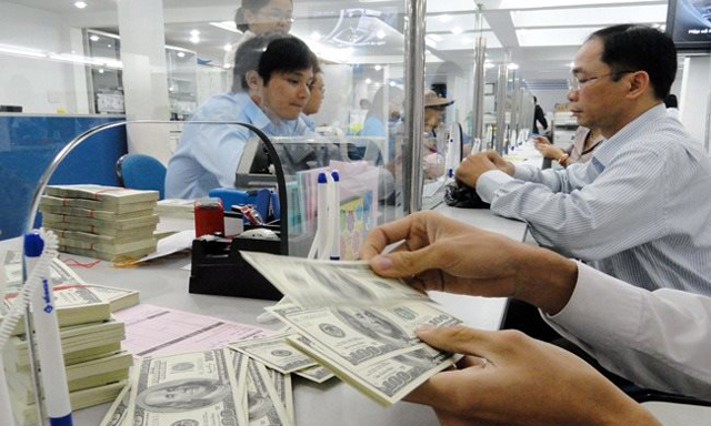 Áp lực tỷ giá được dự báo sẽ xuất hiện trong thời gian cuối năm. Nguồn: Internet