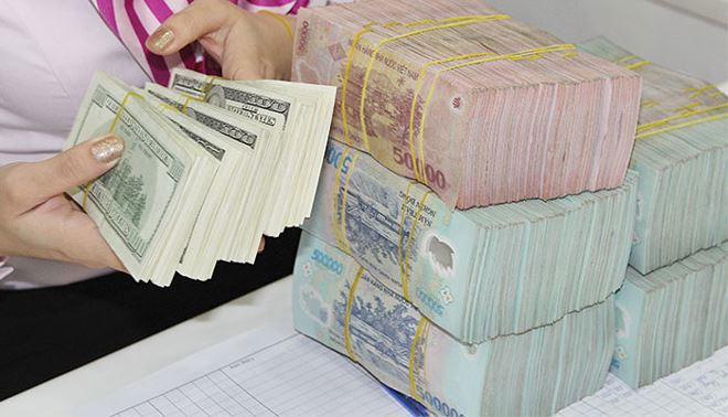 Đã có những ý kiến trái chiều về việc có nên phá giá VND. Nguồn: Internet