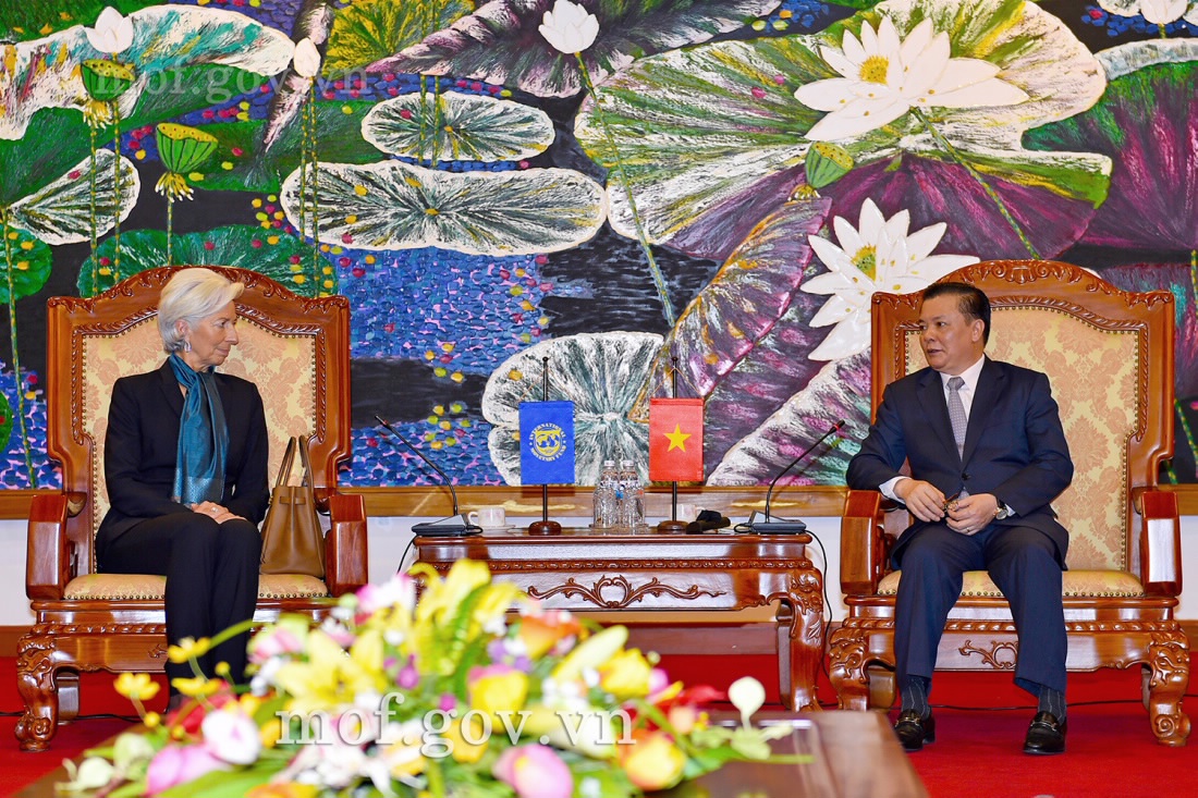 Bộ trưởng Đinh Tiến Dũng và bà Christine Lagarde - Tổng Giám đốc IMF. Ảnh: MT
