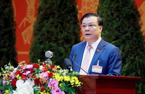 Đồng chí Đinh Tiến Dũng, Ủy viên Trung ương Đảng, Bộ trưởng Bộ Tài chính phát biểu tham luận tại Đại hội lần thứ XIII của Đảng.