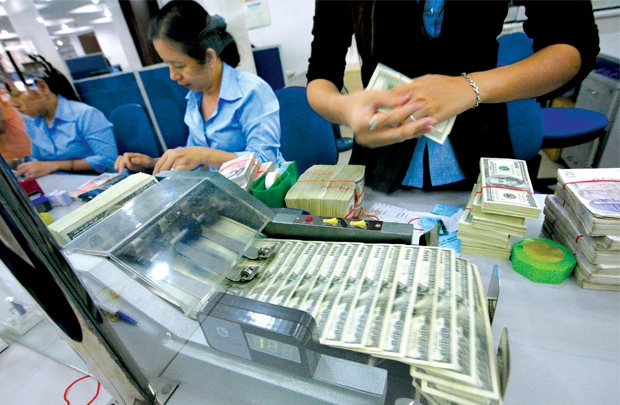 Chênh lệch lãi suất cho vay ngoại tệ và VND vẫn duy trì ở mức khá cao