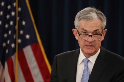 Chủ tịch Fed Jerome Powell thông tin việc giữ nguyên lãi suất, tại buổi họp báo sau cuộc họp 2 ngày của FOMC - Ảnh: Reuters