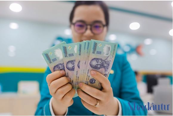  Tăng trưởng tín dụng quý I/2022 đạt 4,03%. Ảnh: Trọng Hiếu 