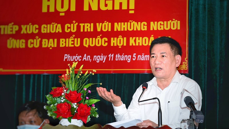 Bộ trưởng Bộ T&agrave;i ch&iacute;nh ph&aacute;t biểu tại Hội nghị tiếp x&uacute;c cử tri x&atilde; Phước An, huyện Tuy Phước, tỉnh B&igrave;nh Định, chiều ng&agrave;y 11/5/2021. Ảnh: Minh Tuấn