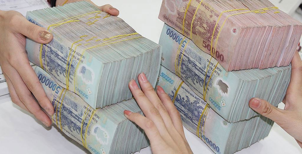 Việc hạn chế ngân hàng thương mại dùng vốn ngắn hạn cho vay trung và dài hạn cần được nhìn nhận là động lực để Việt Nam phát triển mạnh mẽ hơn thị trường vốn. Ảnh: Tường Lâm
