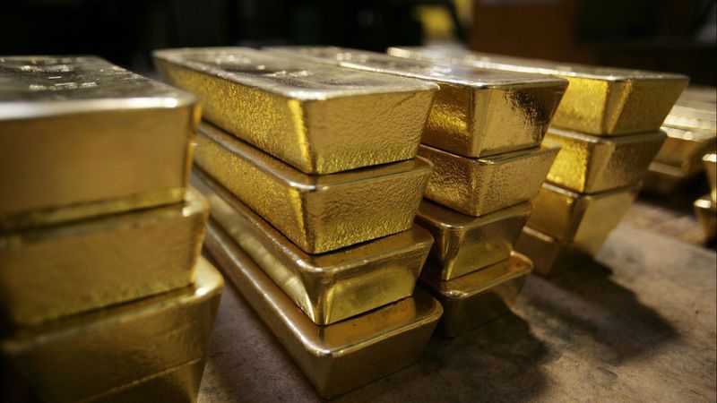 Giá vàng tăng cao sau khi Fed phát tín hiệu sẵn sàng có đợt giảm lãi suất đầu tiên kể từ năm 2008. Ảnh: Sebastian DeRungs / TFW AFP / Getty Images