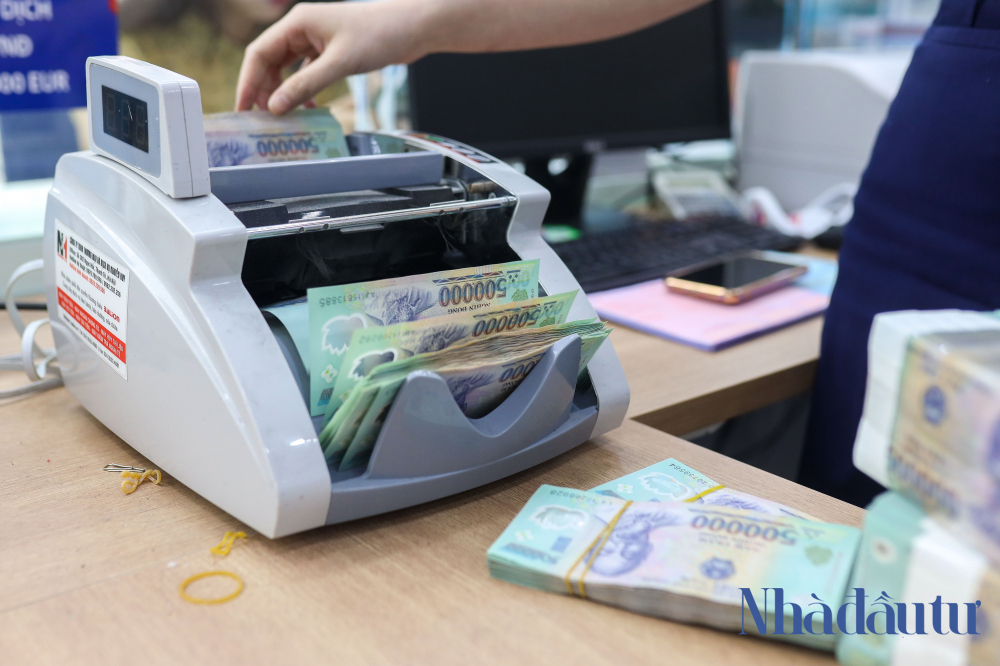 NHNN có thể tiếp tục nới lỏng chính sách tiền tệ do ảnh hưởng của dịch bệnh COVID-19. Ảnh Trọng Hiếu.