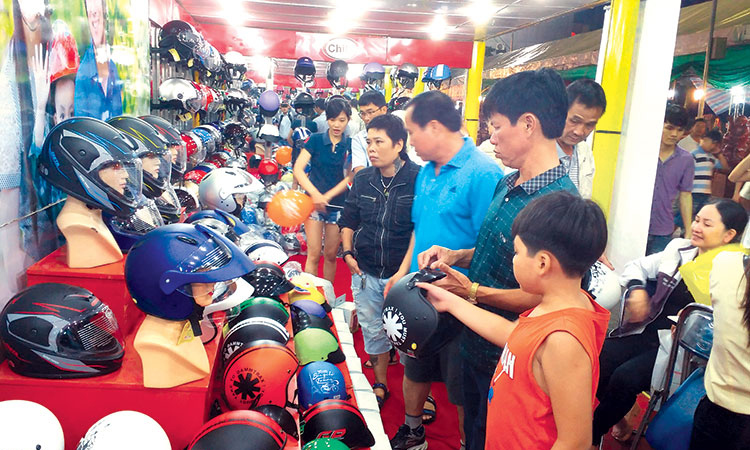  Doanh nghiệp đưa hàng Việt về nông thôn thông qua các Phiên chợ hàng Việt. Ảnh: X. Thảo 
