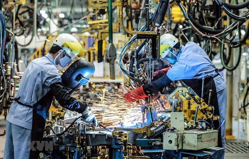 Kinh tế Việt Nam sẽ tăng tốc trong năm 2022 với tăng trưởng GDP dự báo tăng lên mức 5,5% so với 2,6% năm 2021. (Ảnh: TTXVN)
