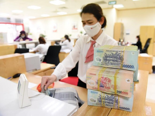 Trong nửa đầu năm 2022, tăng trưởng tín dụng đạt tới 9,35% trong khi huy động vốn chỉ tăng khoảng 4,51%. (Ảnh minh họa).
