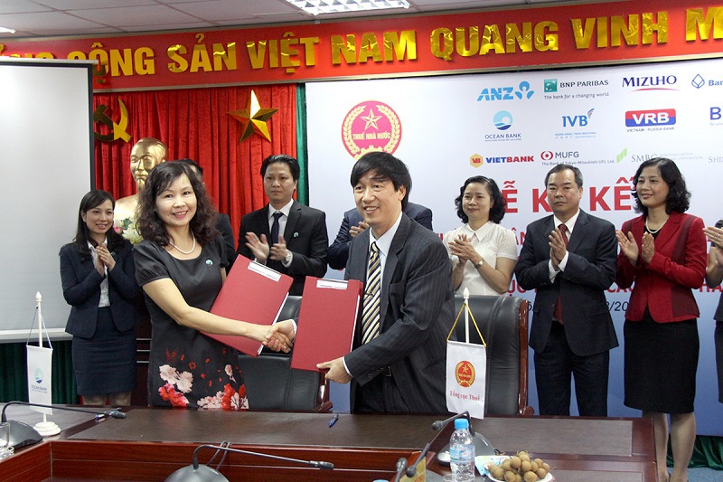Ký kết thỏa thuận hợp tác triển khai dịch vụ nộp thuế điện tử giữa Tổng cục Thuế với các ngân hàng.