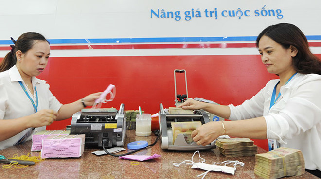 Các ngân hàng đã có sự chuẩn bị cho nhu cầu tiền mặt của doanh nghiệp, cá nhân trong 2 tuần trước kỳ nghỉ Tết Âm lịch. Nguồn: internet.