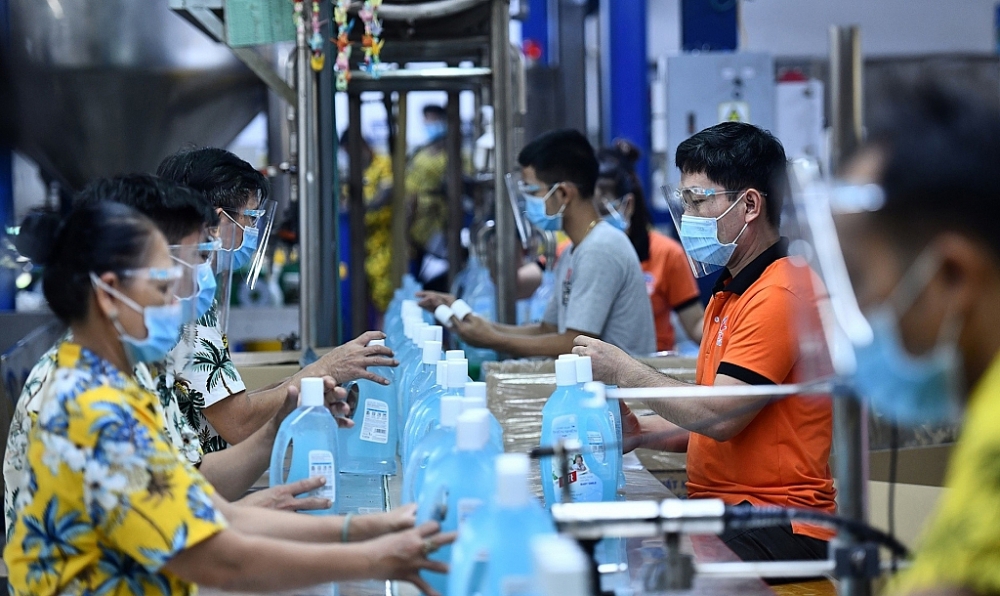 Một số chi phí liên quan đến hoạt động phòng chống dịch COVID-19 sẽ được trừ khi tính thuế thu nhập doah nghiệp. Ảnh: Phạm Ngôn.
