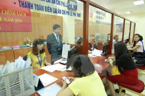 Cải cách hành chính đã hỗ trợ khá nhiều cho doanh nghiệp. Ảnh minh họa: TTXVN