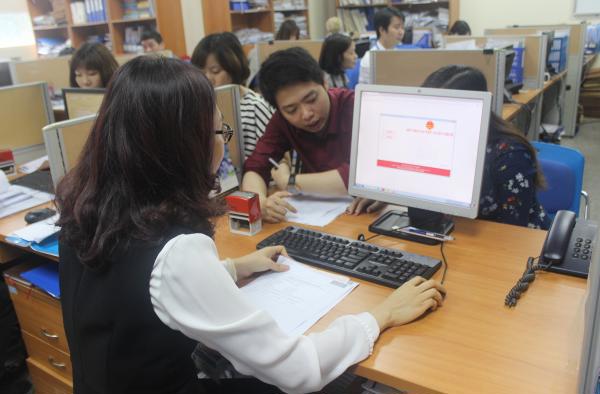 Những ứng dụng thuế điện tử đã góp phần không nhỏ trong việc cải cách hành chính thuế. Ảnh: Thùy Linh.
