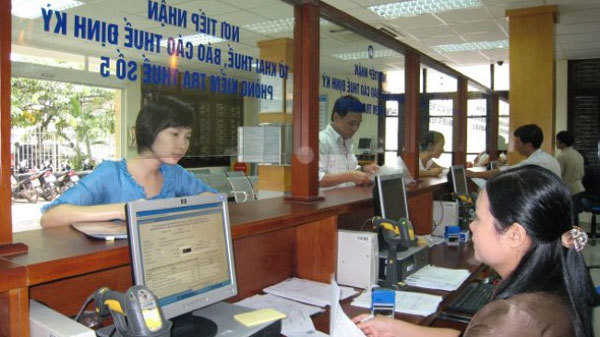 Thời gian qua Cục Thuế Hà Nội đang thực hiện Đề án hóa đơn điện tử để giảm chi phí cho DN, bản thân cơ quan thuế. Ảnh: Thu Hằng