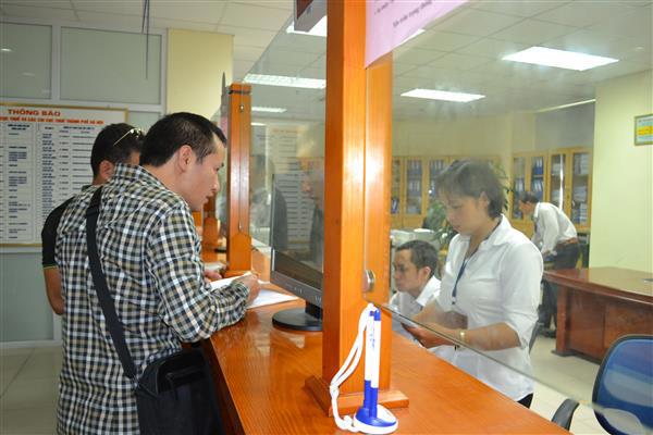  TP. Hồ Chí Minh và Hà Nội là 2 địa phương dẫn đầu cả nước với số nợ lần lượt là 9.890 tỷ đồng và 13.530 tỷ đồng. Ảnh TL. 