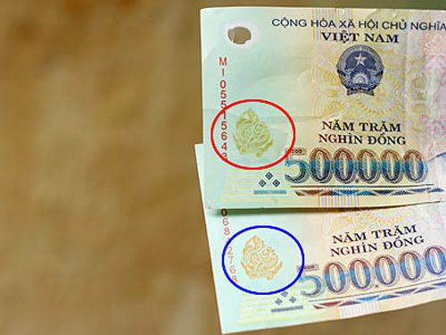 Tiền giả sẽ bị đóng dấu, bấm lỗ
